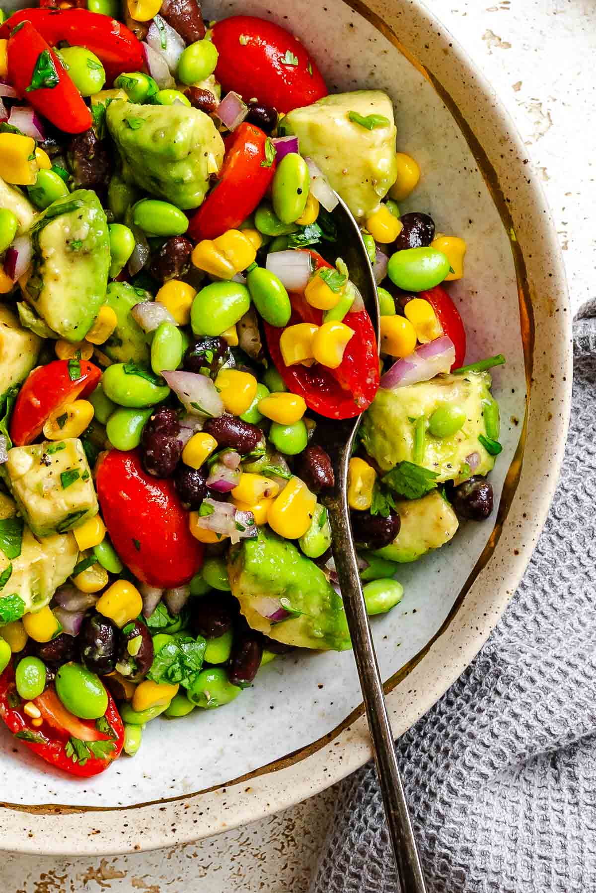 Completed Edamame Salad (With Corn and Black Beans) in a bowl.