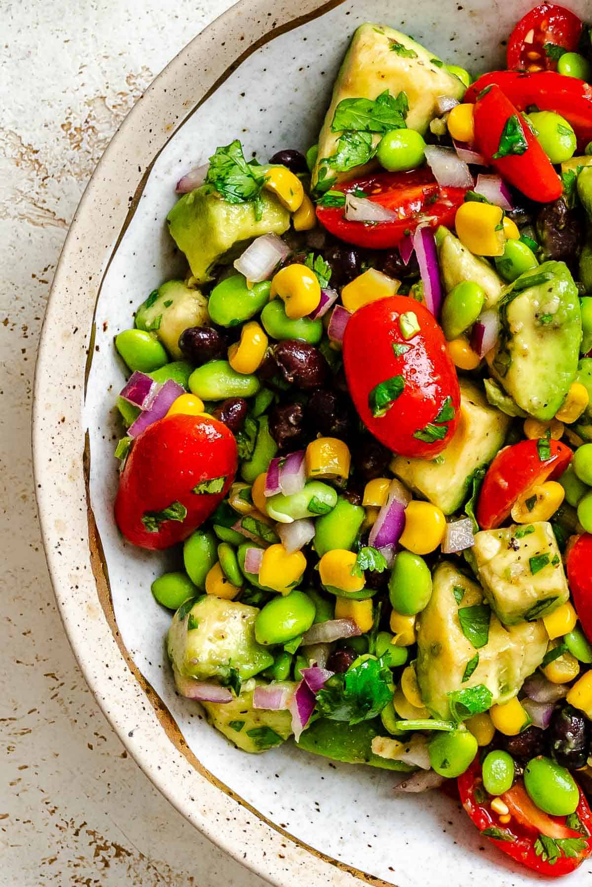 Completed Edamame Salad (With Corn and Black Beans) in a bowl.