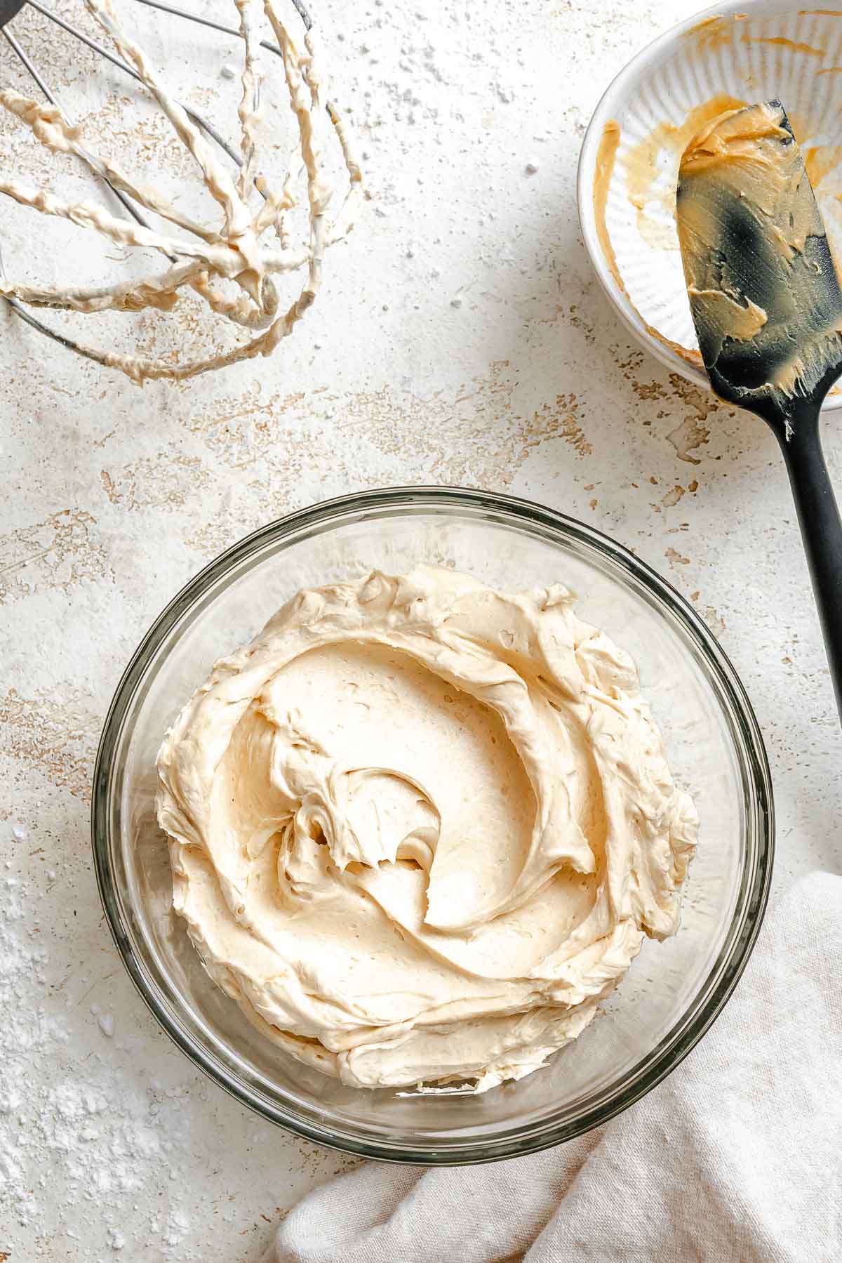 Completed Easy Peanut Butter Frosting in glass bowl.