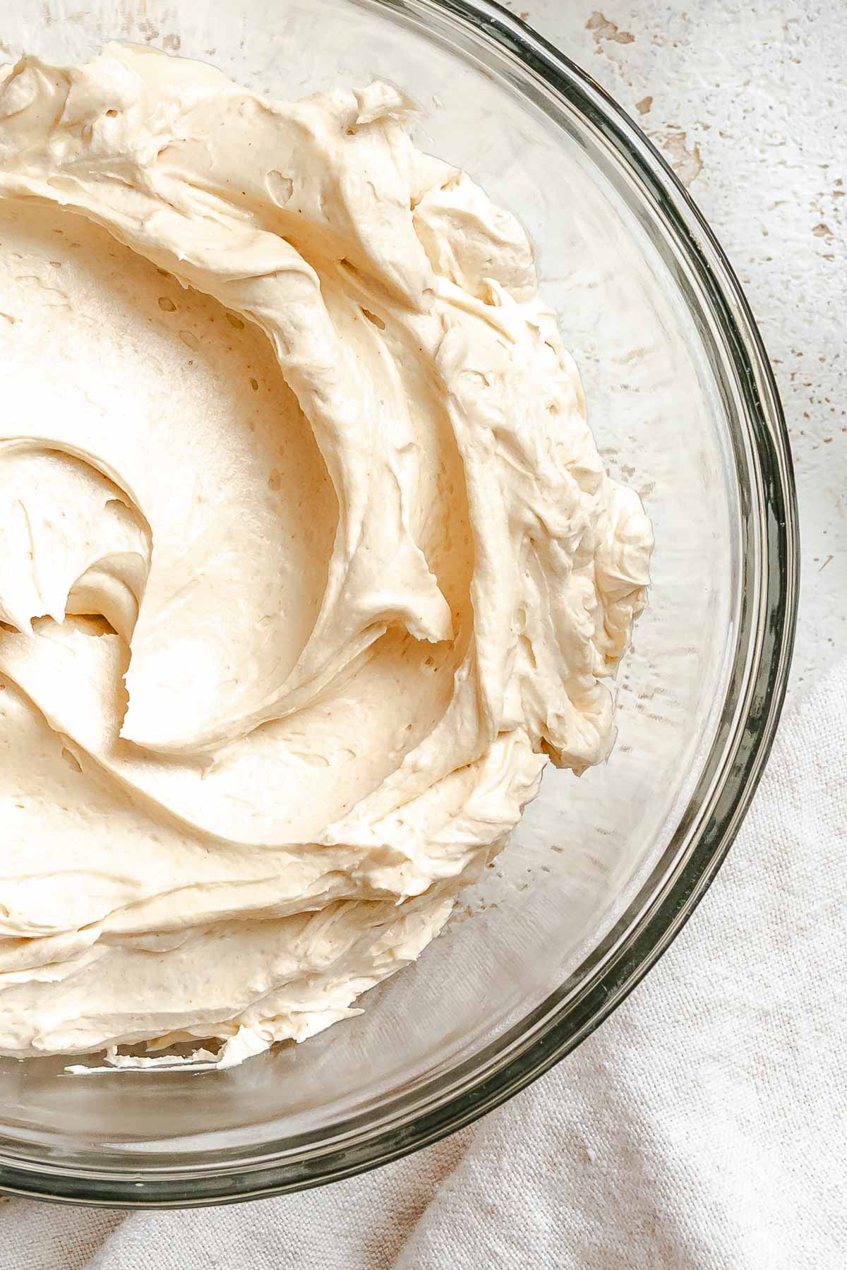 Completed Easy Peanut Butter Frosting in glass bowl.