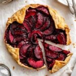 Completed Easy Plum Tart (Plum Galette) on a white surface.
