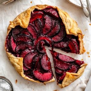 Completed Easy Plum Tart (Plum Galette) on a white surface.