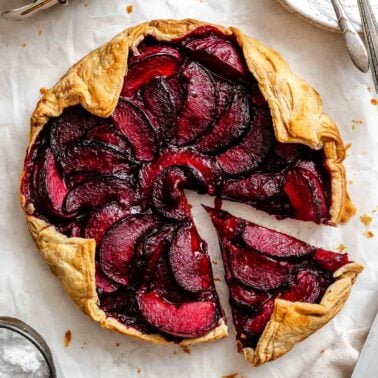 Completed Easy Plum Tart (Plum Galette) on a white surface.