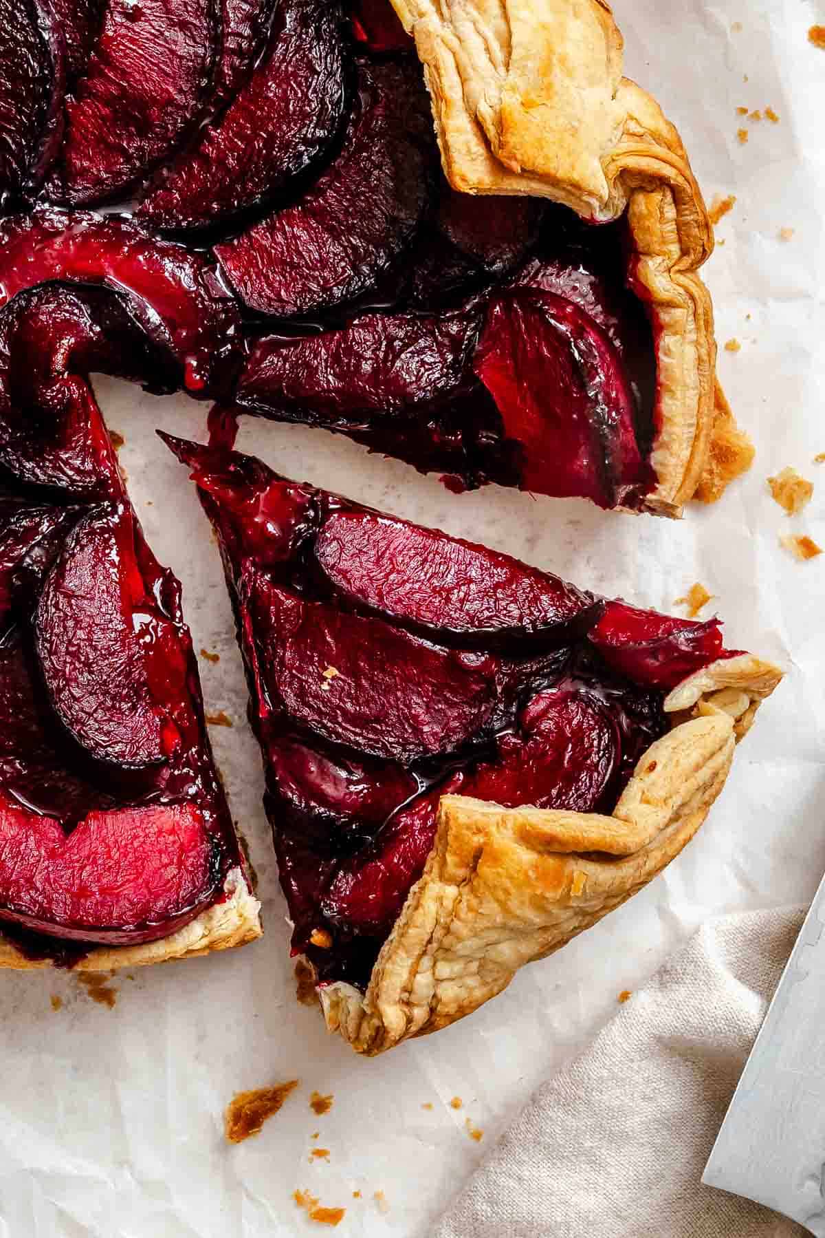 Completed Easy Plum Tart (Plum Galette) on a white surface.
