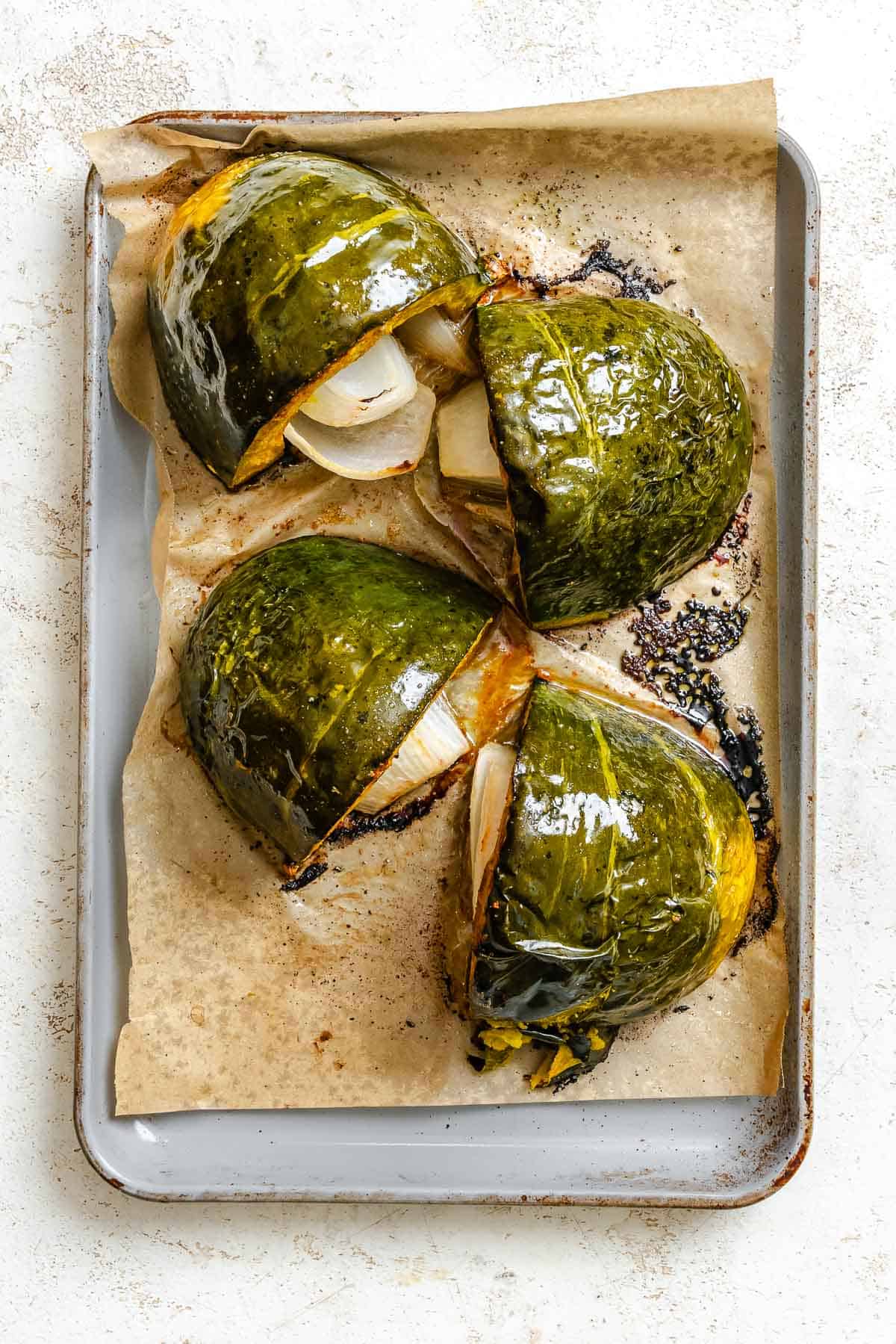 Process shot showing Kabocha Squash on a baking tray post cooking.