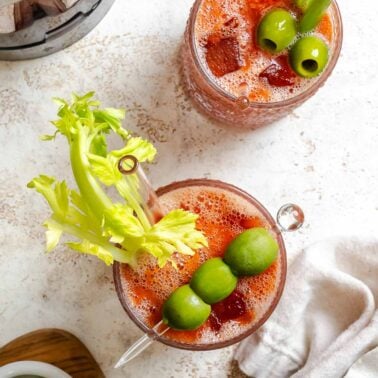 Completed Virgin Bloody Mary drinks in glasses.