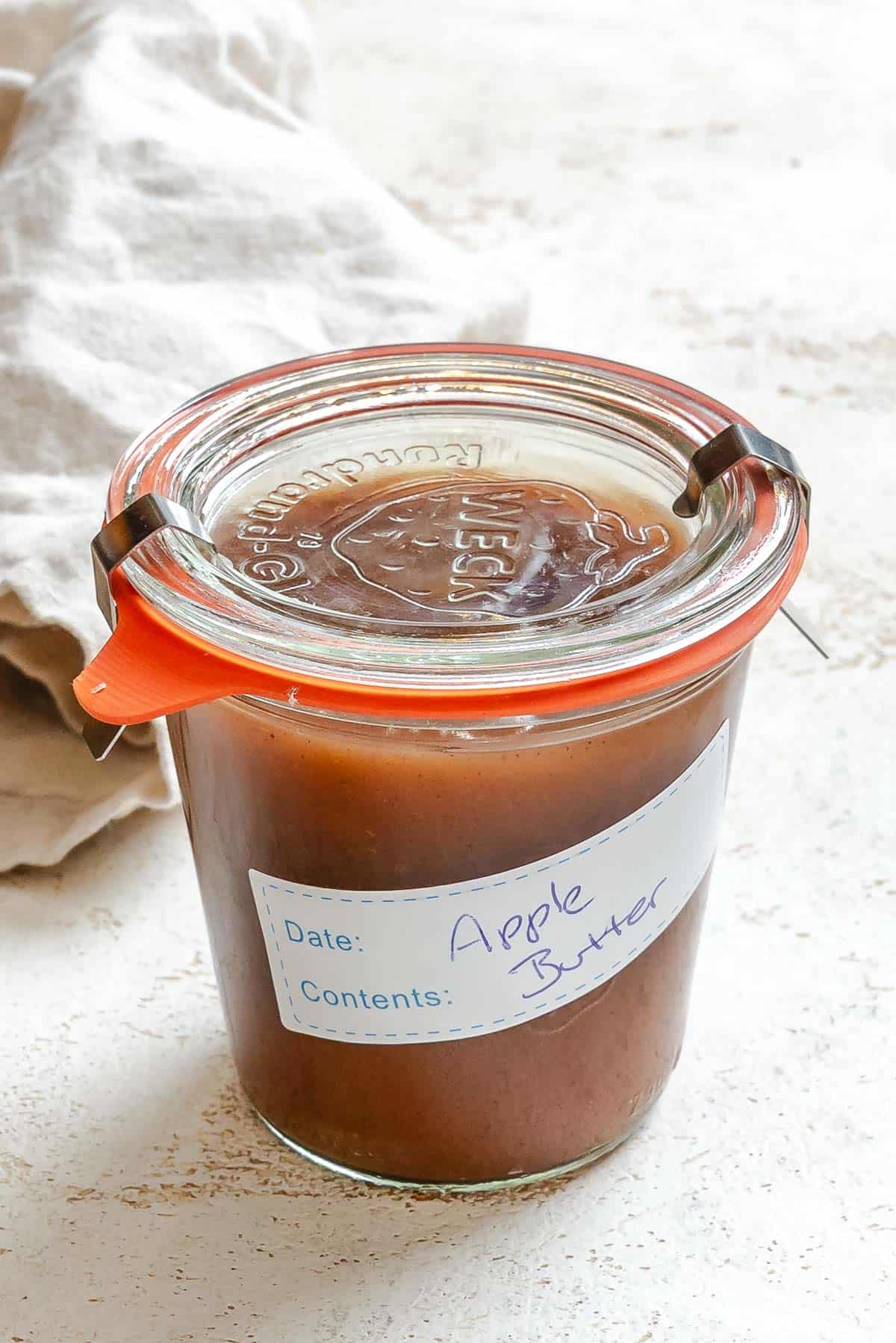 Completed Instant Pot Apple Butter in a jar.