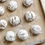 Completed Gingerbread Crinkle Cookies (Eggless!) on a baking dish.