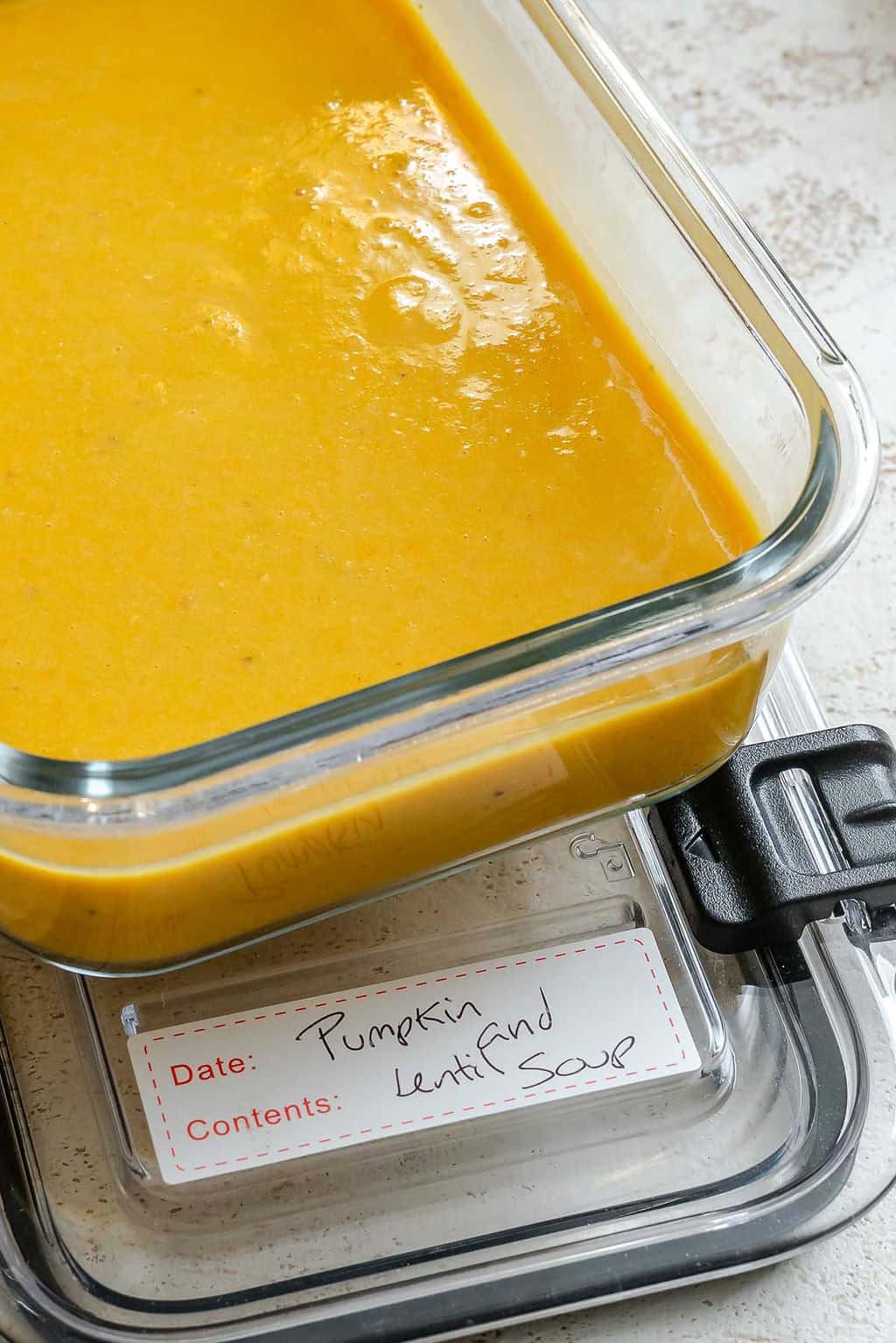 Completed Lentil and Pumpkin Soup in a storage container.