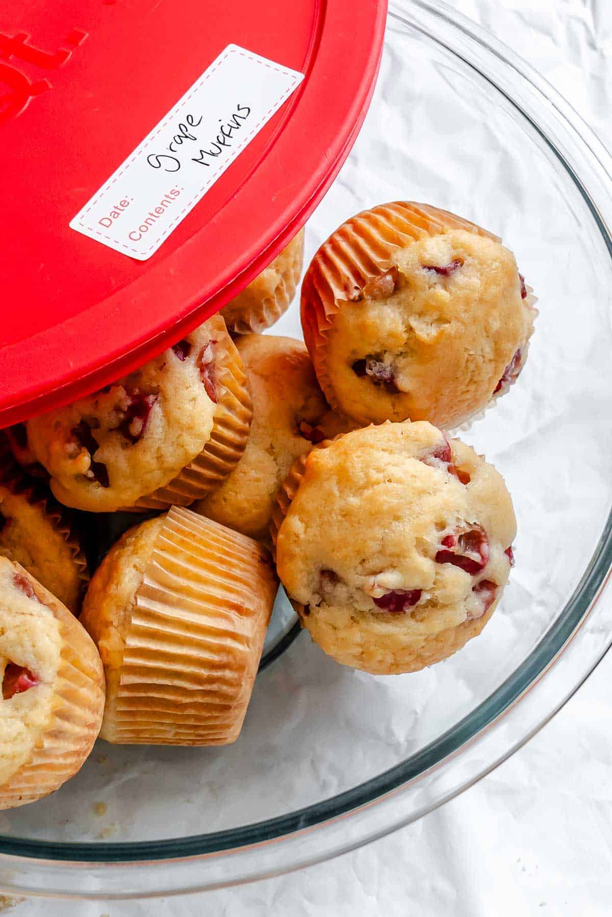 Completed Grape Muffins (Egg-Free) in a storage container.