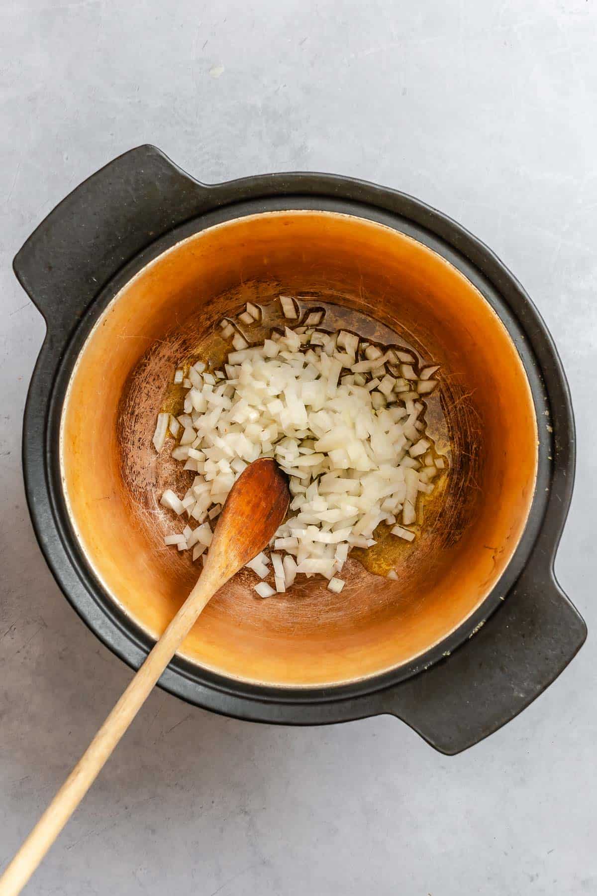 Process shot showing stirring ingredients in a bowl.