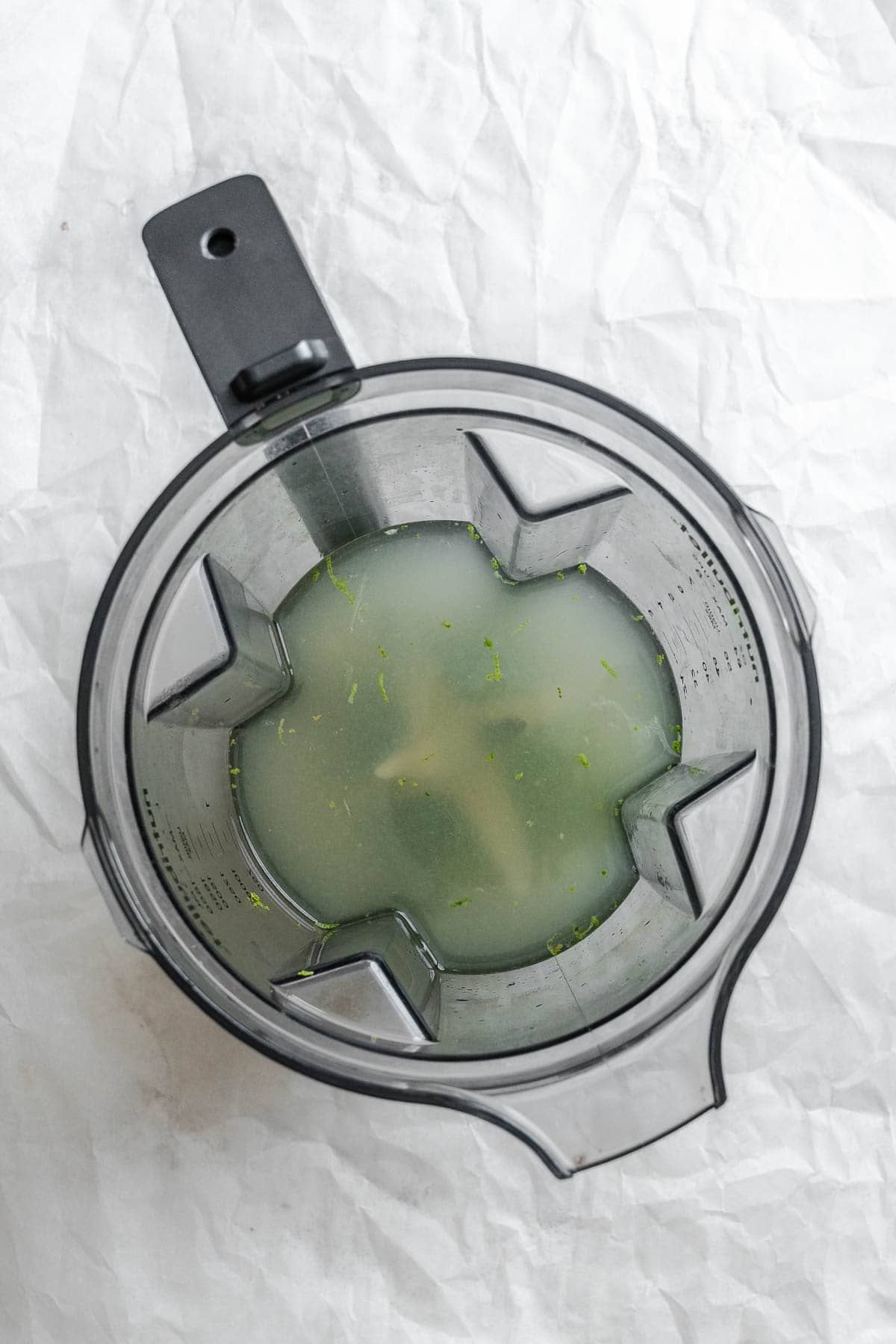 Process shot showing ingredients added to blender.