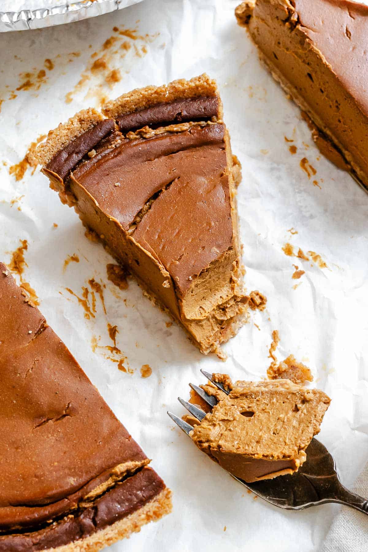 Completed Chocolate Pumpkin Pie pieces on a white surface.
