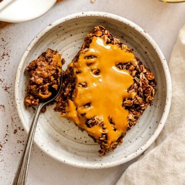 Completed Chocolate Banana Baked Oatmeal (with peanut butter) on a plate.