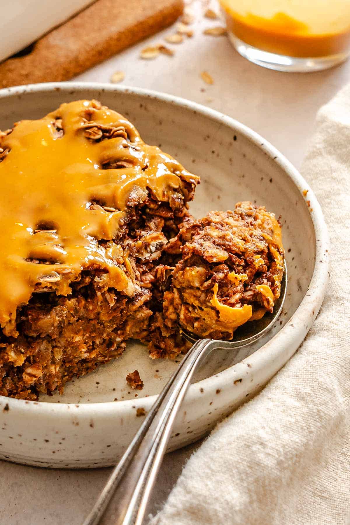 Completed Chocolate Banana Baked Oatmeal (with peanut butter) on a plate.