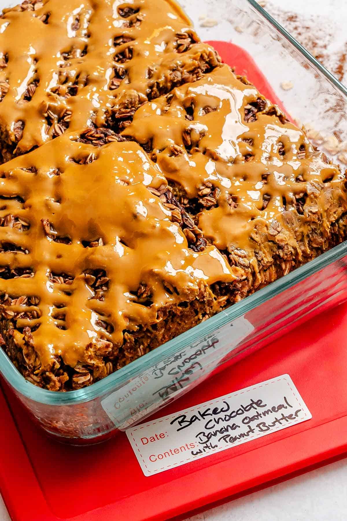 Completed Chocolate Banana Baked Oatmeal (with peanut butter) in a storage container.