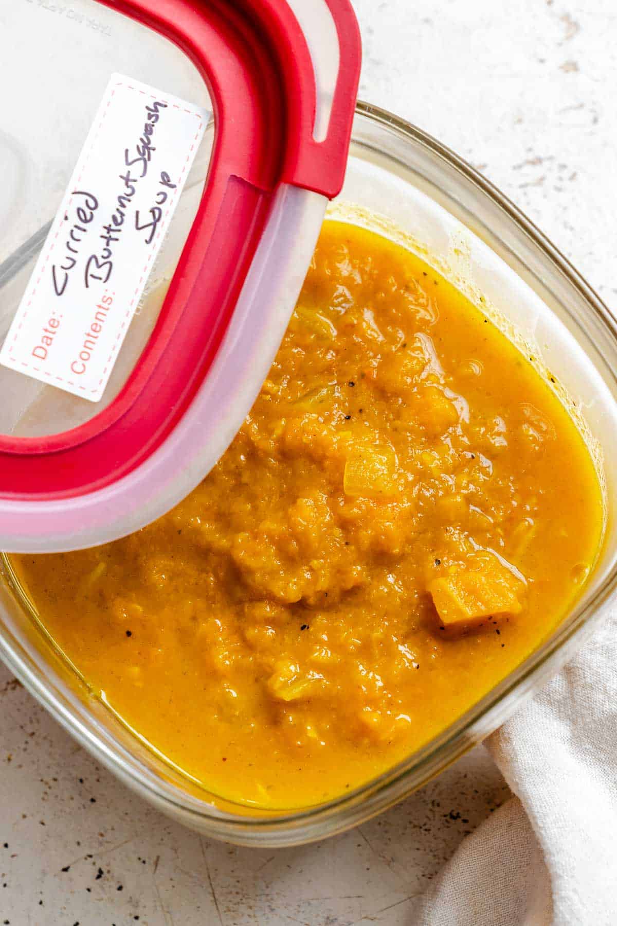 Completed Curried Butternut Squash Soup in a storage container.