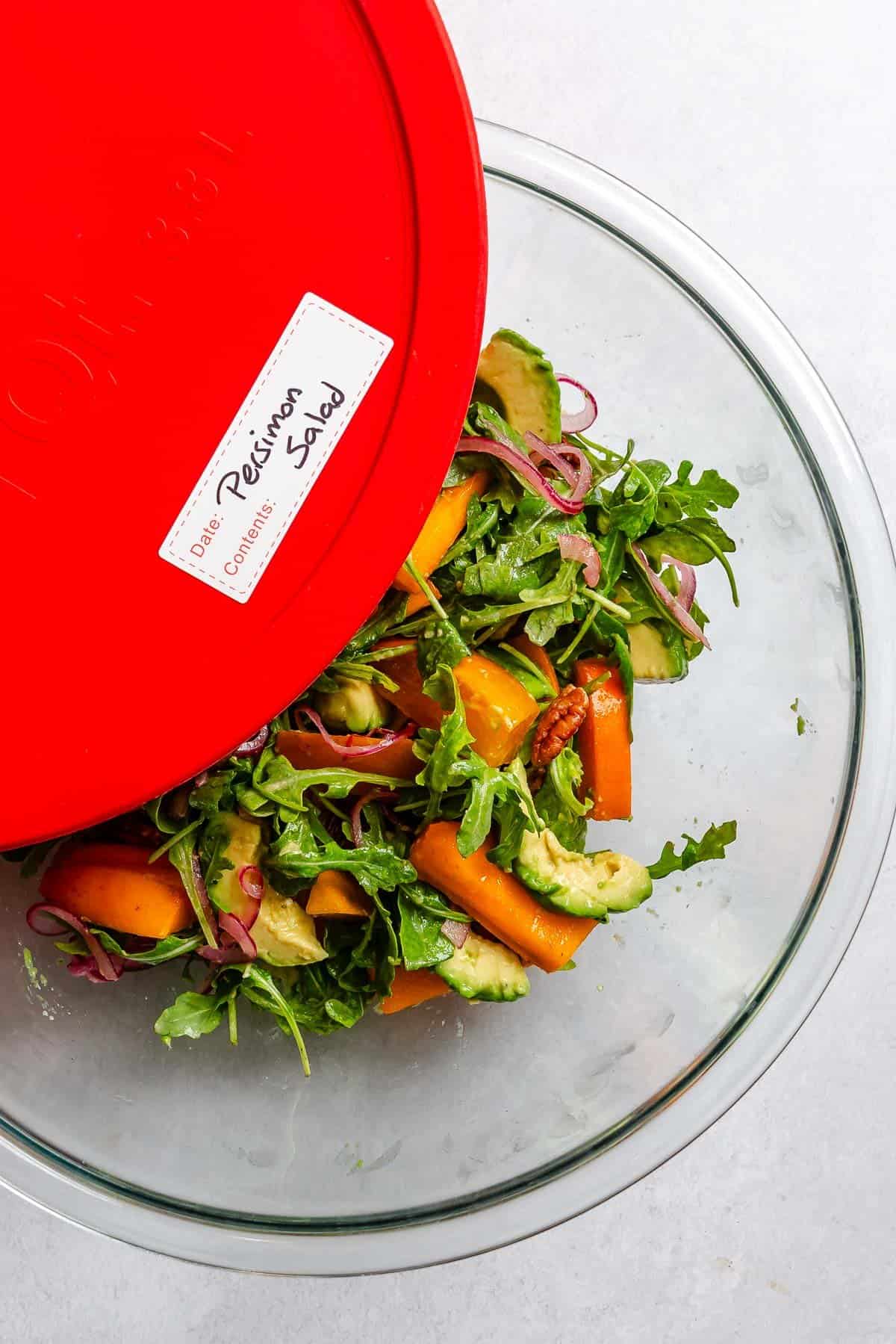 Completed Persimmon Salad in a storage container.