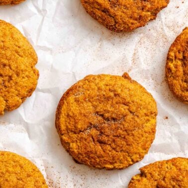 Completed Pumpkin Snickerdoodles on a white surface.