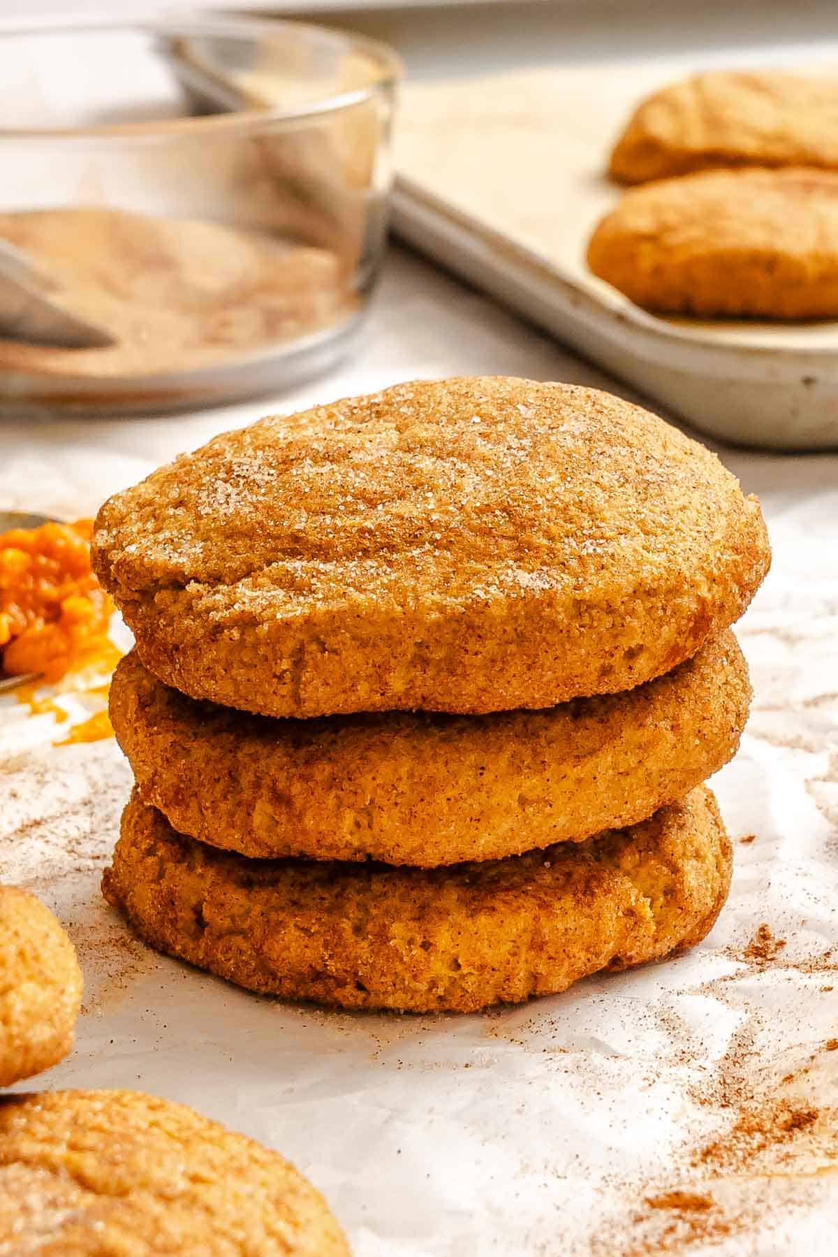 Completed Pumpkin Snickerdoodles on a white surface.