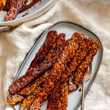 Completed Tempeh Bacon on a serving tray.