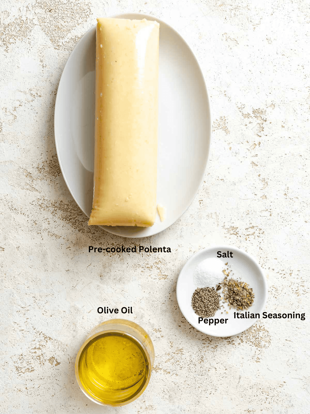 Ingredients for Simple Polenta Fries measured out on a white surface.