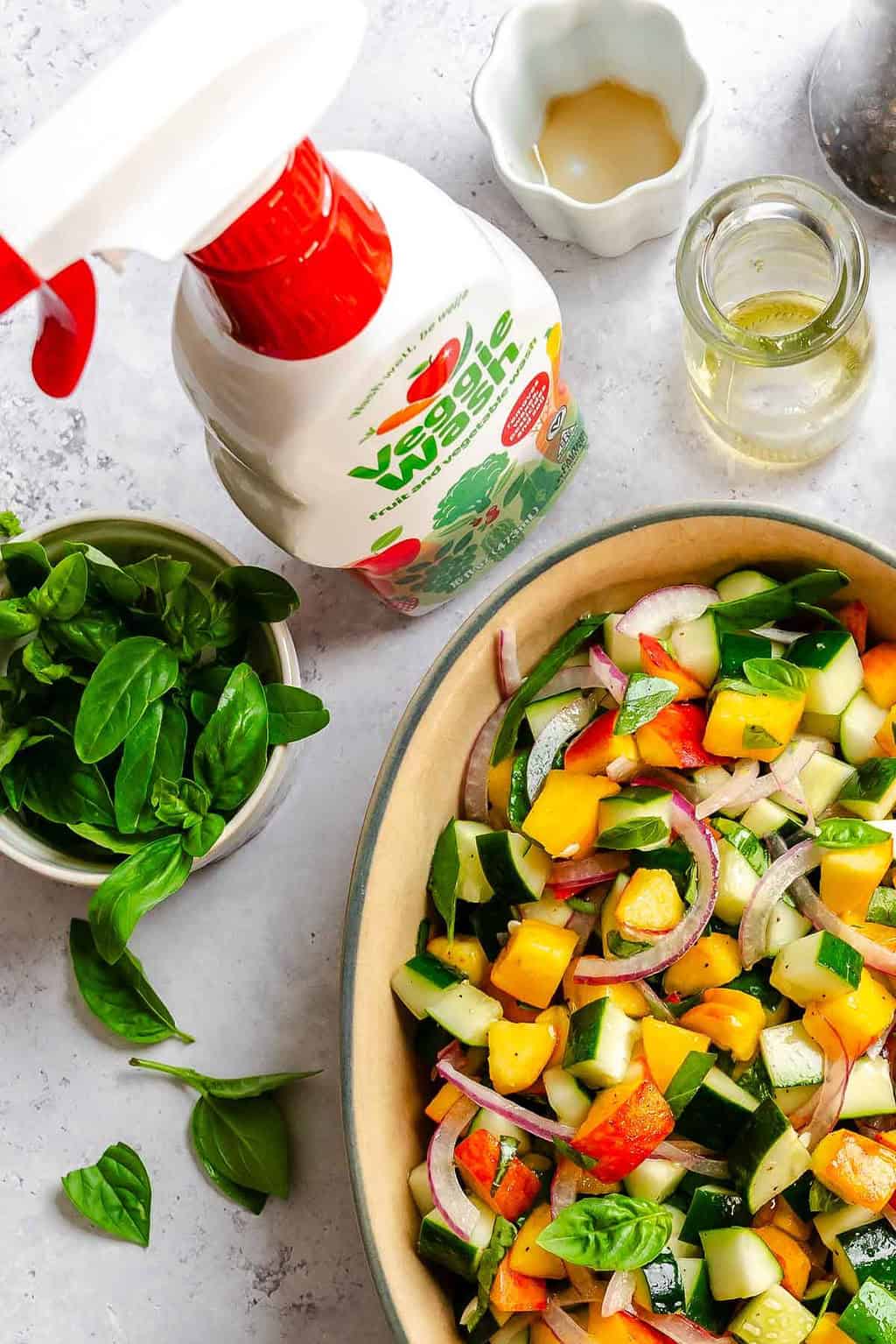 Completed Cucumber Peach Salad in a plate.