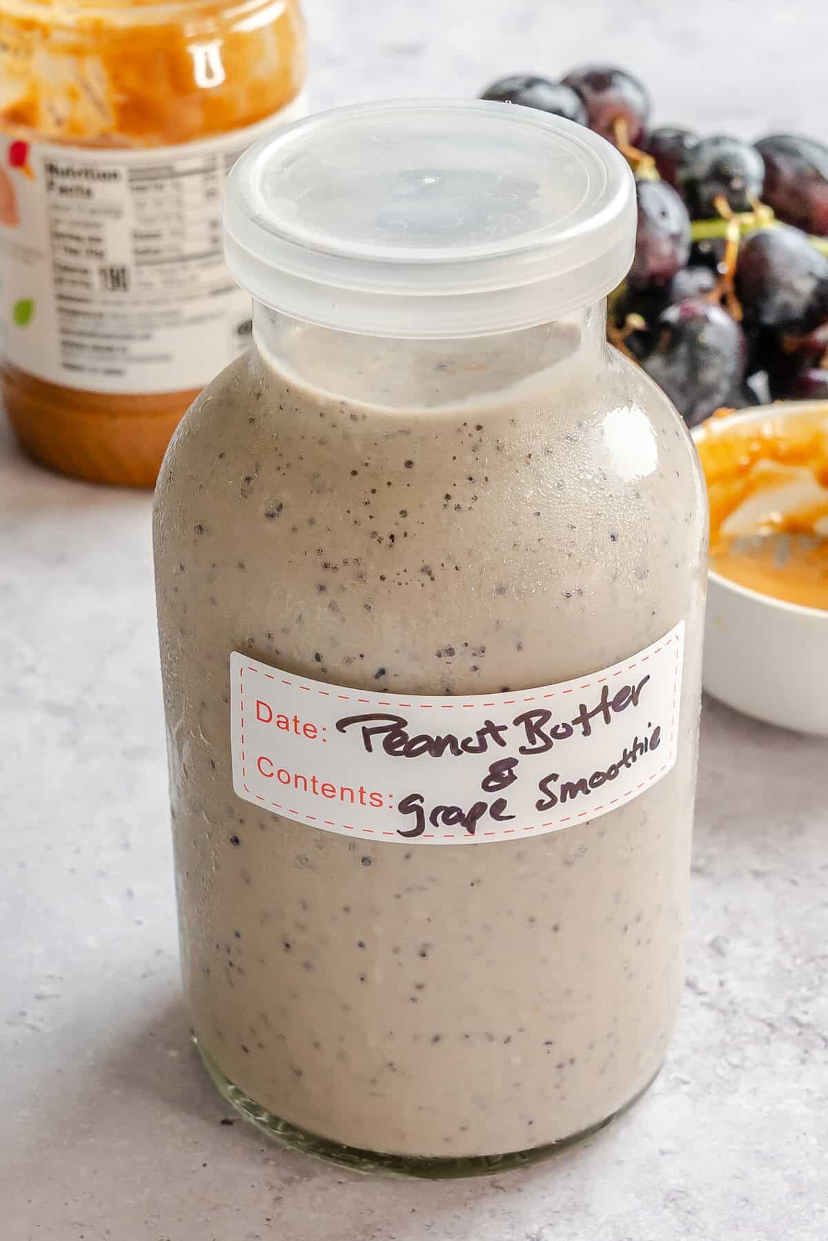 Completed Peanut Butter & California Grape Smoothie in a storage container.